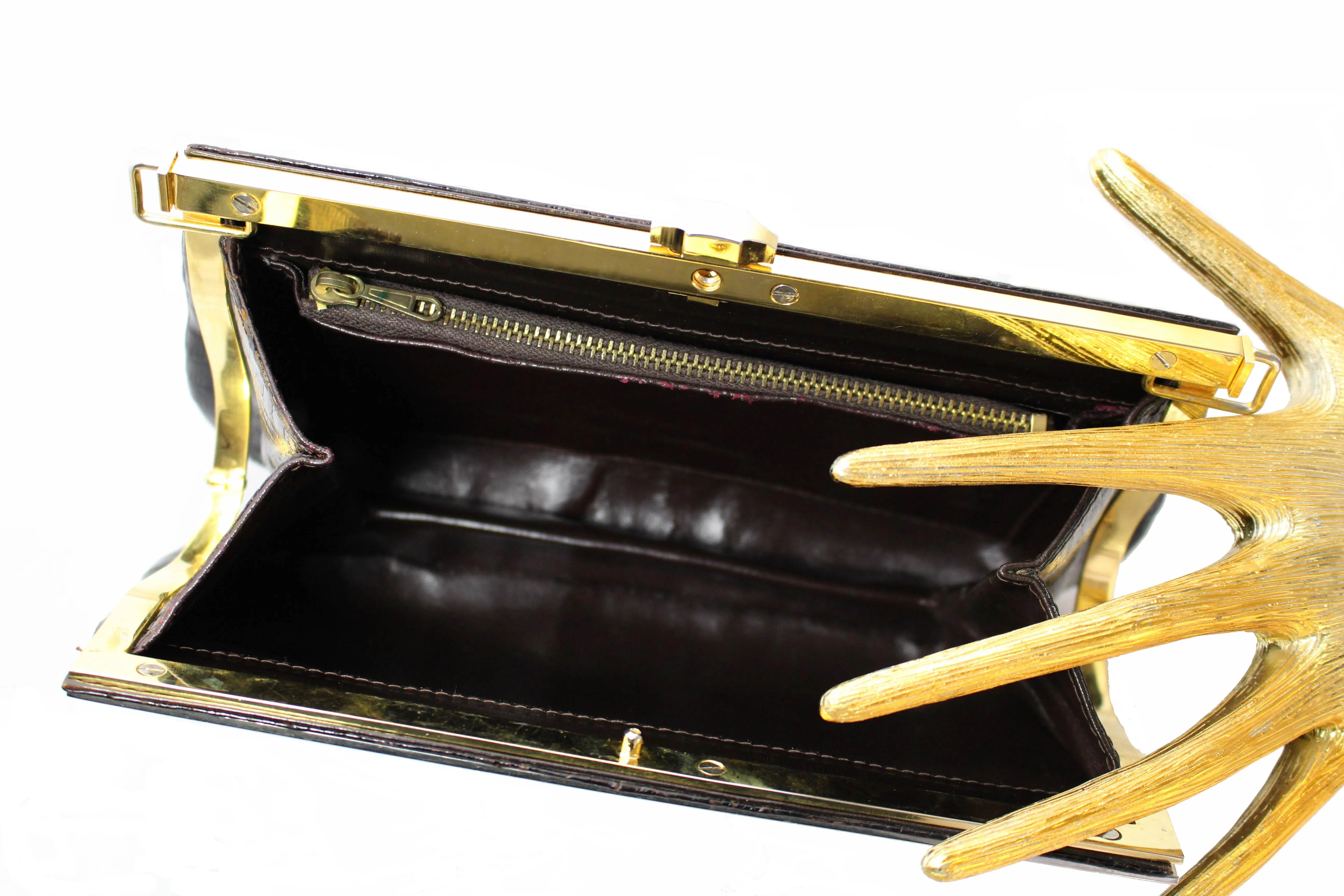 Brown baby crocodile skin frame clutch